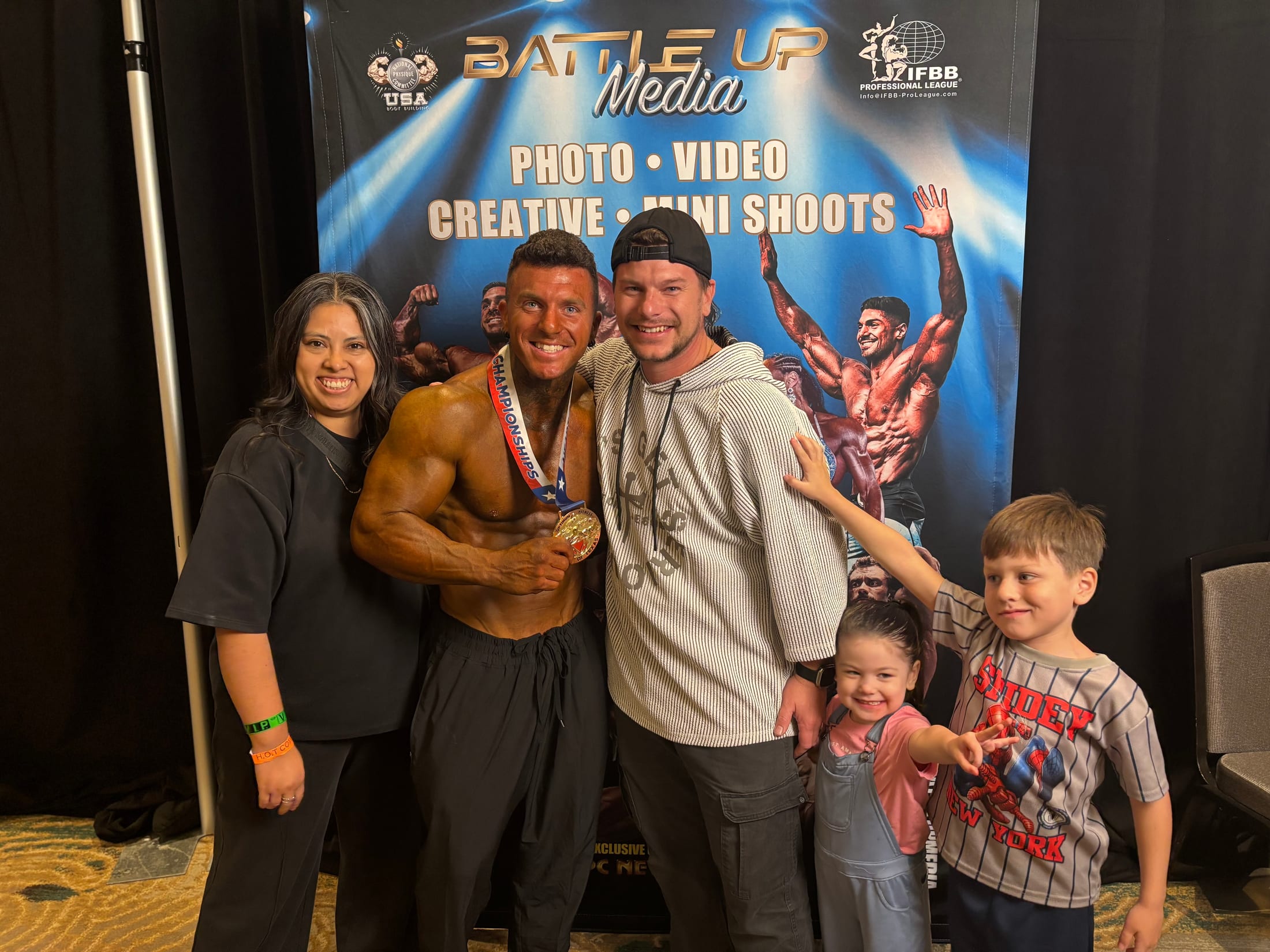 Lance celebrating with family and friends after a competition